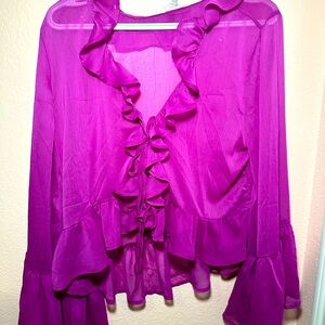 Ruffle shear shirt.